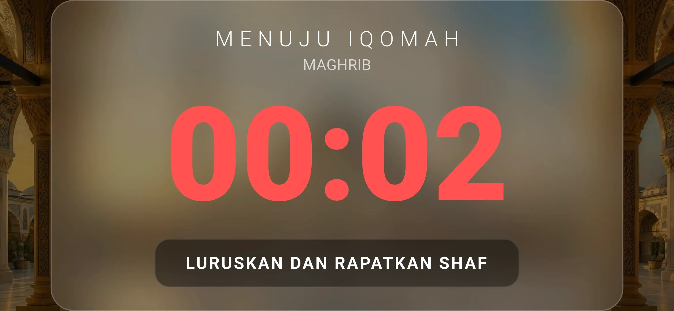 Layar hitung mundur menuju iqomah dengan pengingat meluruskan shaf